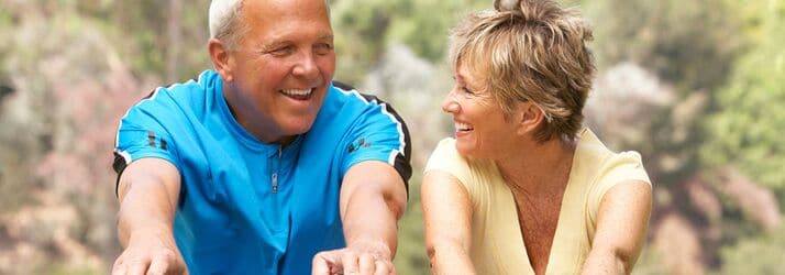 Senior couple biking